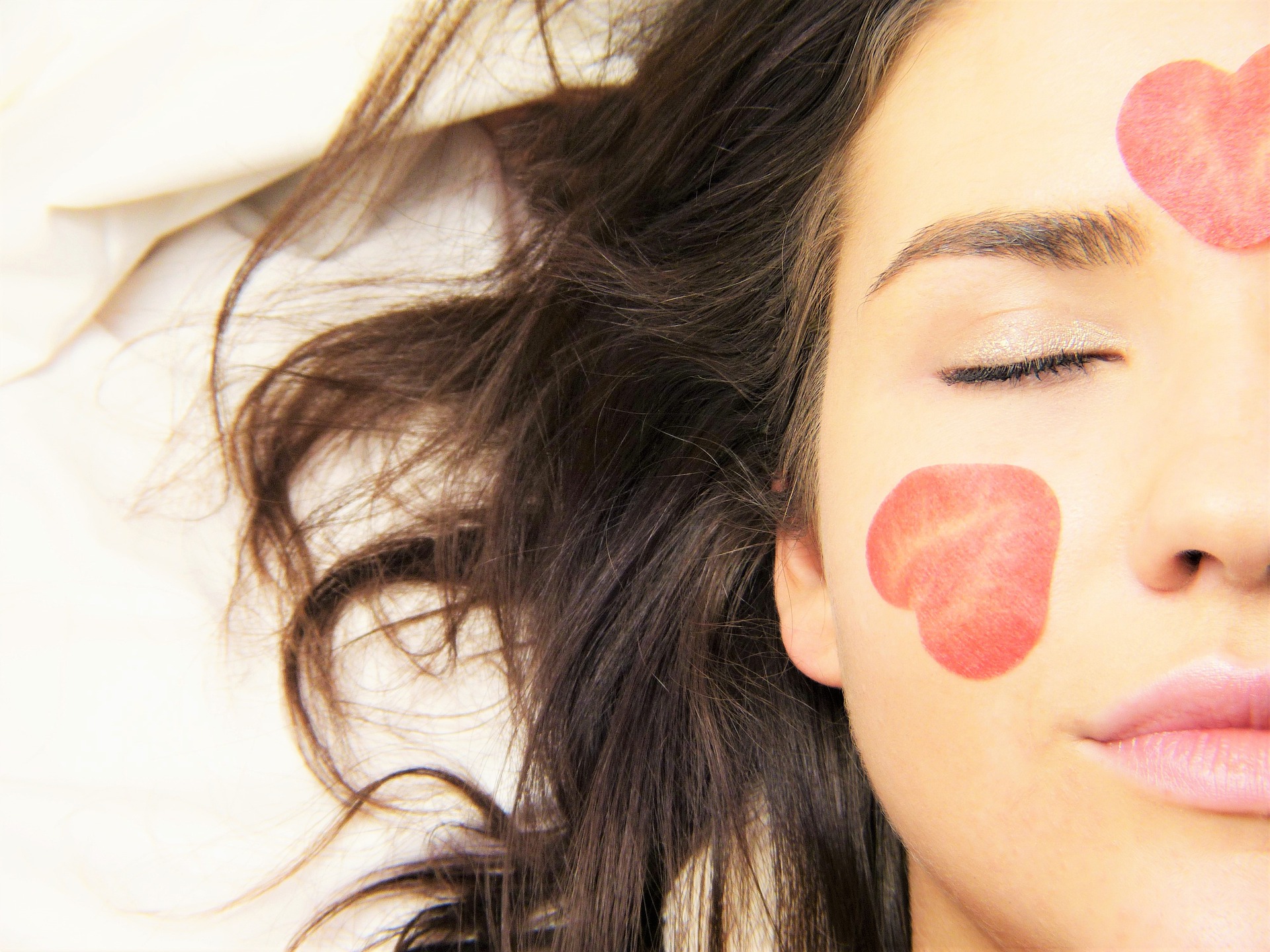 Face with lip stick hearts